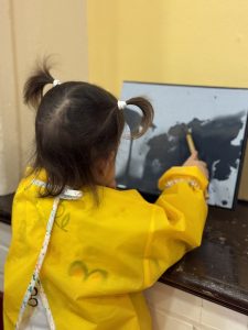 A young girl drawing